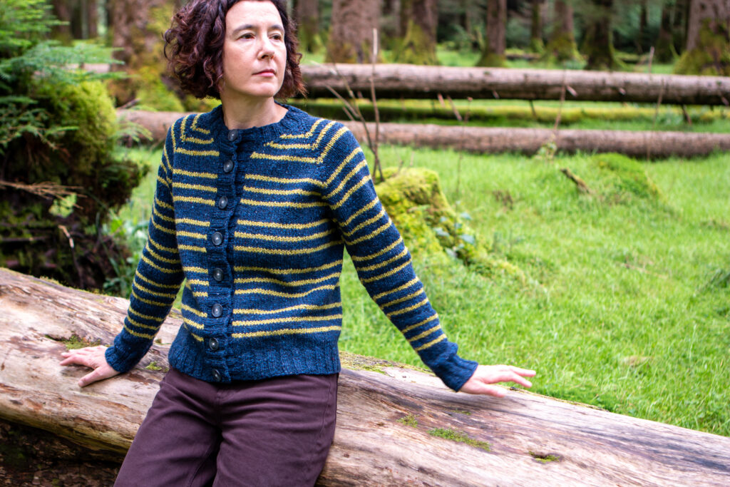 Carol wearing the Trio of Light carding showing the subtle neck shaping. 