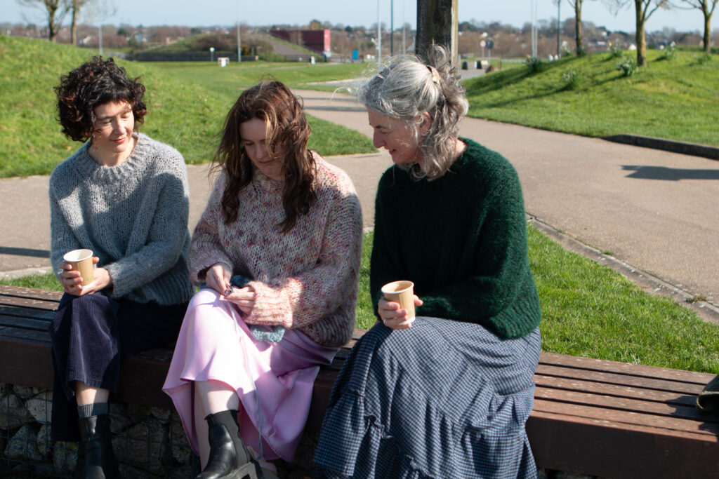 Carol, Hannah and Jean all wearing their Laura Sweater. 